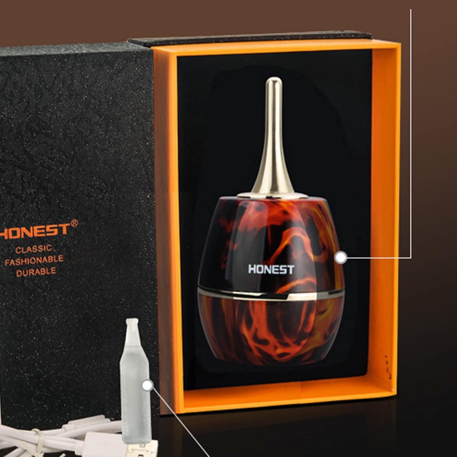 El encendedor Honest 2 en 1 presentado en su elegante caja de regalo, junto con el cable de carga y el manual. Encendedor 2 en 1 eléctrico y de gas